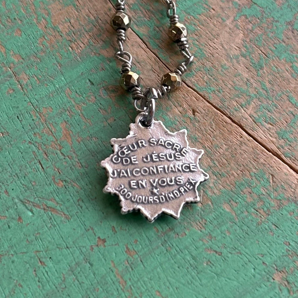 Sacred Heart Burst Hematite Necklace