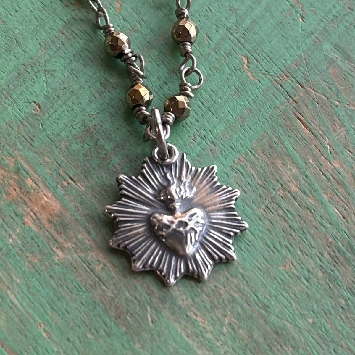 Sacred Heart Burst Hematite Necklace