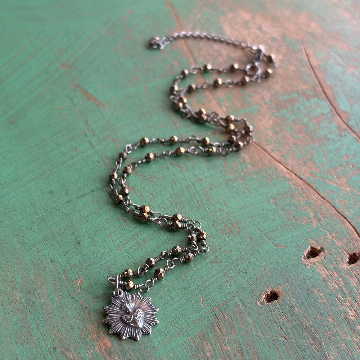 Sacred Heart Burst Hematite Necklace