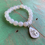 Elegant Saint Bracelets and Earrings