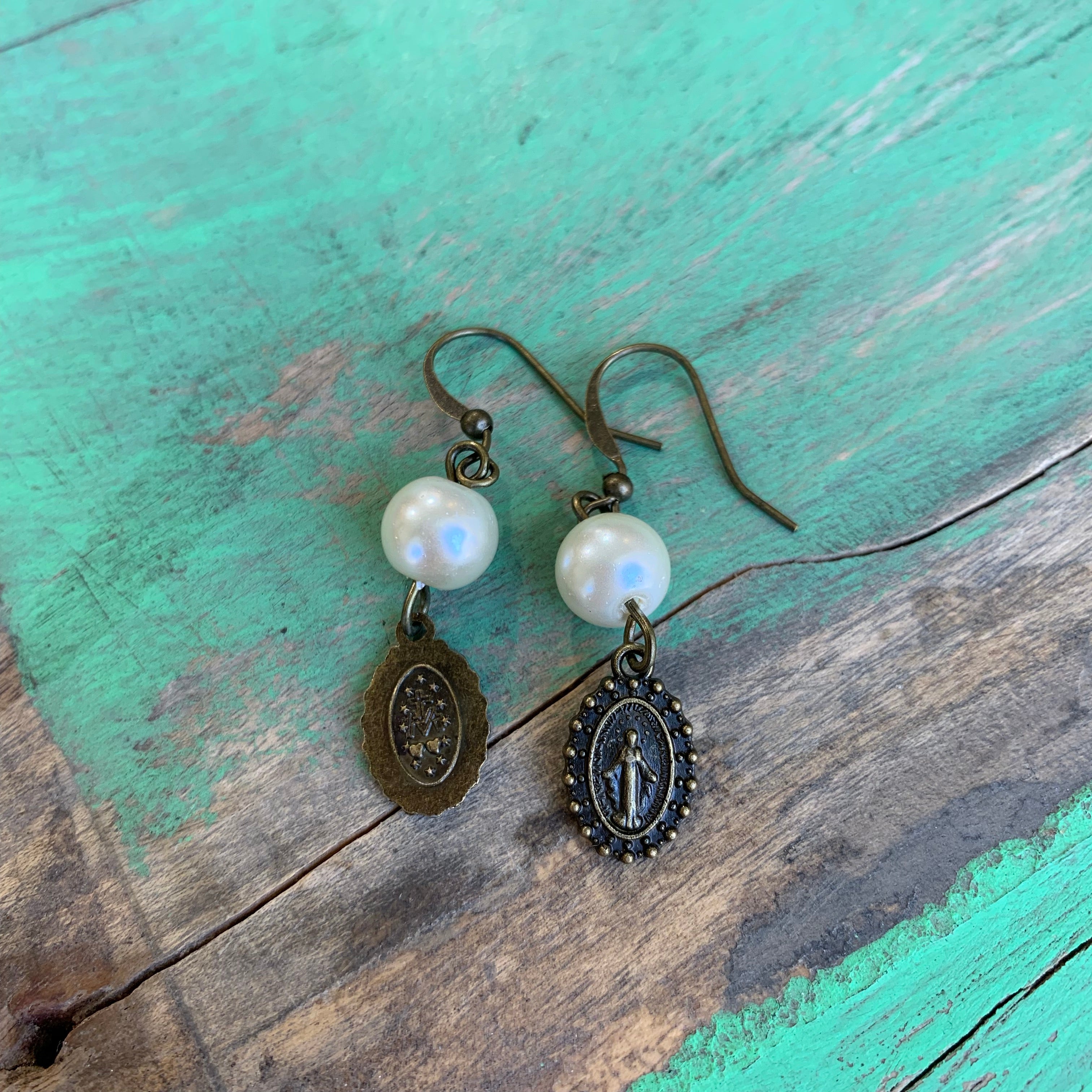 Pearl and bronze earrings