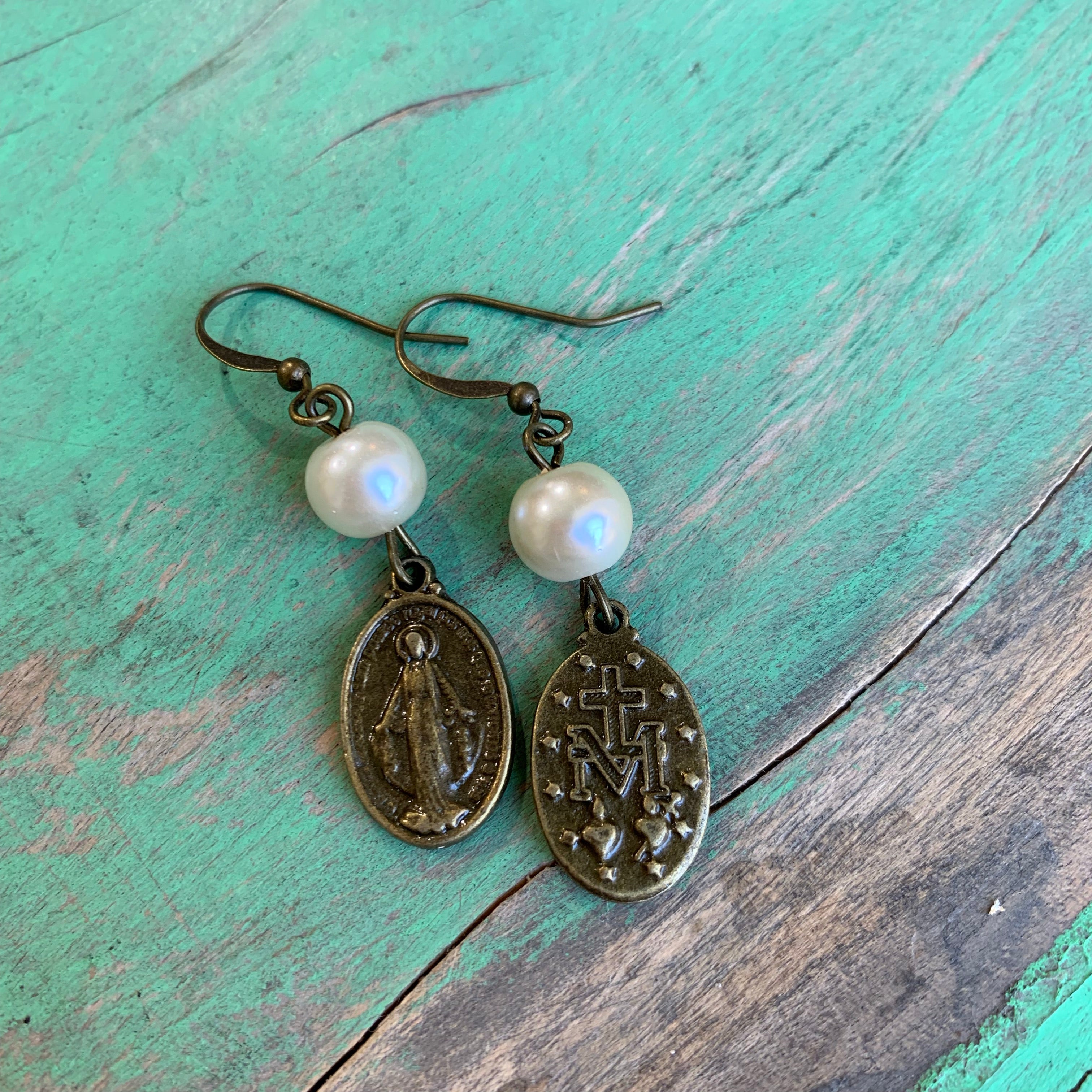 Pearl and bronze earrings